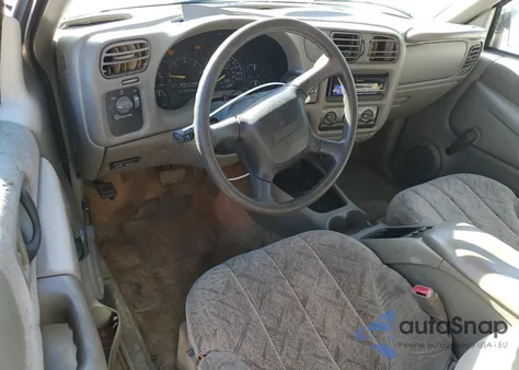 1999 GMC Sonoma z USA, uszkodzony, nr VIN 1GTCS19X0X8530509